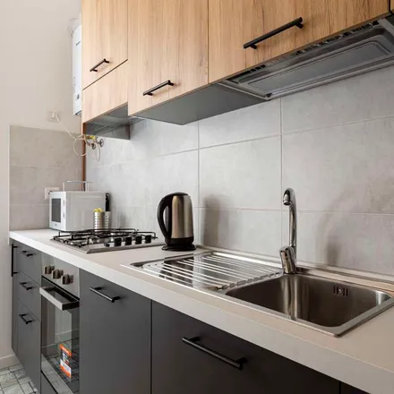 Rent this 1 bed apartment on Via Amatore Sciesa in 29135 Milan MI, Italy
