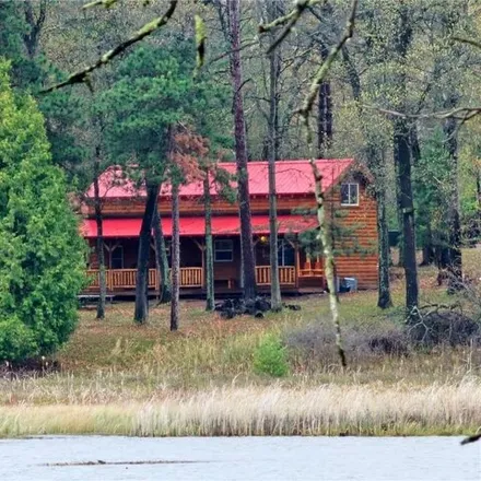 Buy this 2 bed house on 29506 Wilderness Point Cabins in Webb Lake, Scott