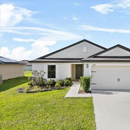 Buy this 3 bed house on 1904 Amber Sweet Cir in Dundee, Florida