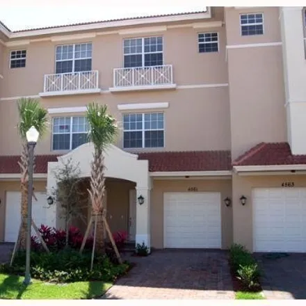 Rent this 3 bed townhouse on 4561 Artesa Way South in Palm Beach Gardens, FL 33418