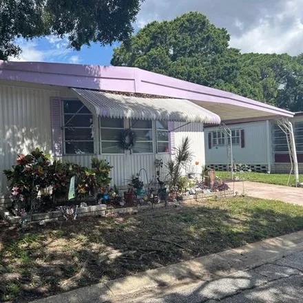 Buy this studio apartment on 7001 142nd Ave N Unit 250 in Largo, Florida