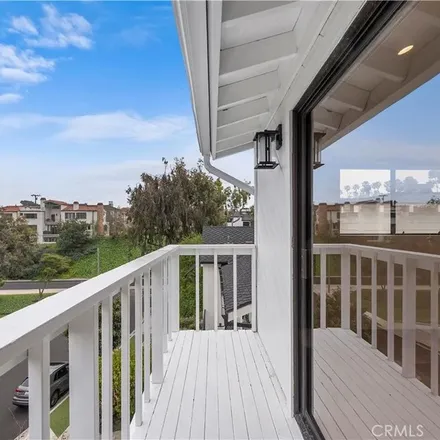 Rent this 2 bed apartment on 405 Heliotrope Avenue in Newport Beach, CA 92625