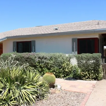 Rent this 2 bed house on 4833 East 18th Street in Tucson, AZ 85711