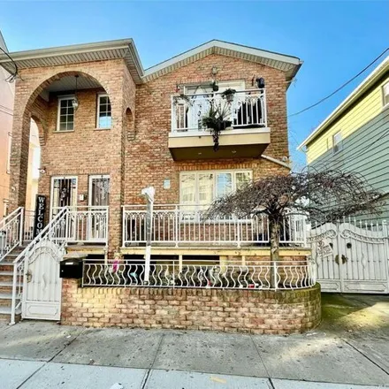 Buy this 6 bed house on 15-20 120th Street in New York, NY 11356