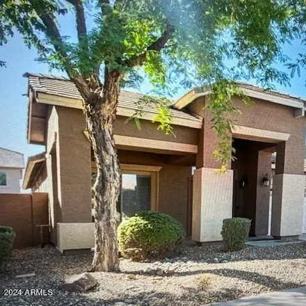 Rent this 4 bed house on 13765 West Crocus Drive in Surprise, AZ 85379