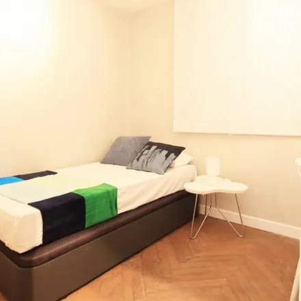 Rent this 13 bed apartment on Calle de Francisco de Rojas in 1, 28010 Madrid