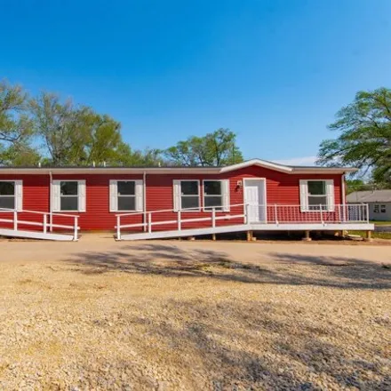 Buy this 4 bed house on 667 North High Street in El Dorado, KS 67042