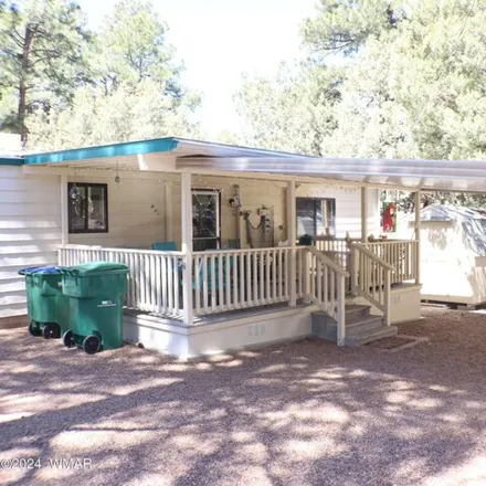Buy this studio apartment on 800 North 43rd Way in Show Low, AZ 85901