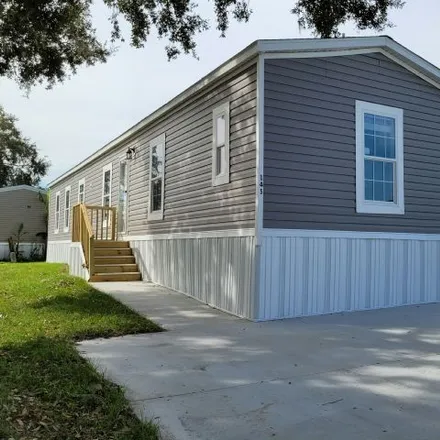Rent this 3 bed house on Sunshine Avenue in Polk County, FL 33801