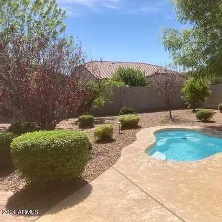 Rent this 3 bed house on 1273 West Popcorn Tree Avenue in San Tan Valley, AZ 85140
