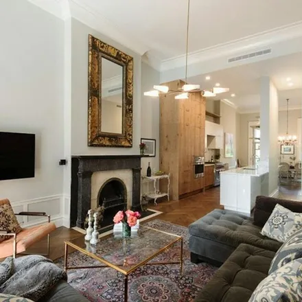 Rent this 4 bed townhouse on 13 East 9th Street in New York, NY 10003