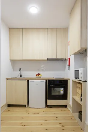 Rent this 1 bed apartment on Igreja de Santa Cruz in Praça 8 de Maio, 3000-274 Coimbra