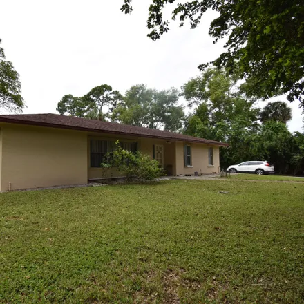 Buy this 3 bed house on 5229 Pinegrove Drive in Palm Beach County, FL 33417