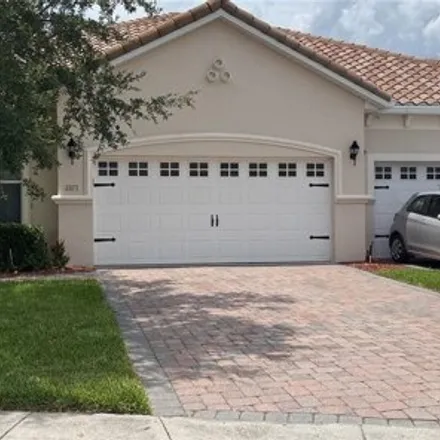 Rent this 3 bed townhouse on 2371 Painter Lane in Kissimmee, FL 34741