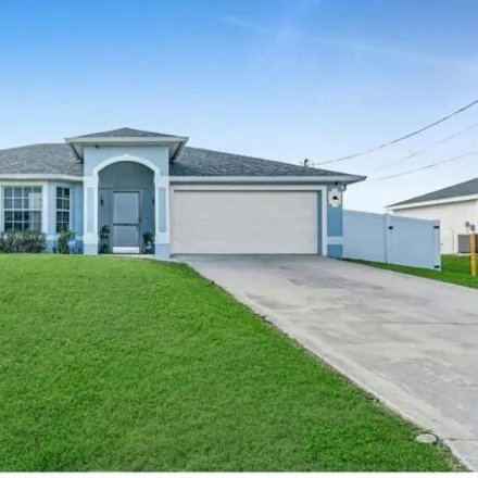 Buy this 3 bed house on 3024 Ne 2nd Ave in Cape Coral, Florida