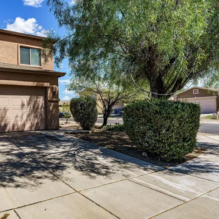 Buy this 4 bed house on 6671 South Stratosphere Lane in Tucson, AZ 85746