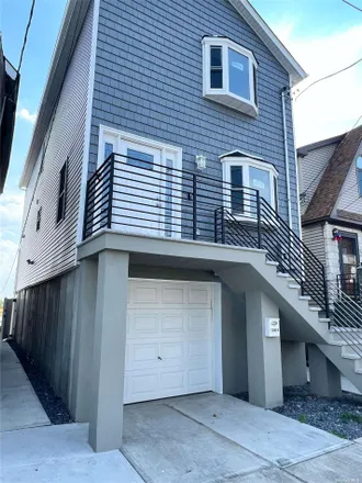 Buy this 3 bed house on 70 West 18th Road in New York, NY 11693