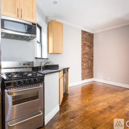Rent this 2 bed duplex on 219 E 23rd St