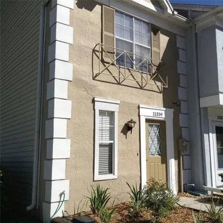 Buy this 2 bed townhouse on 113396 Grandville Drive in Temple Terrace, FL 33617