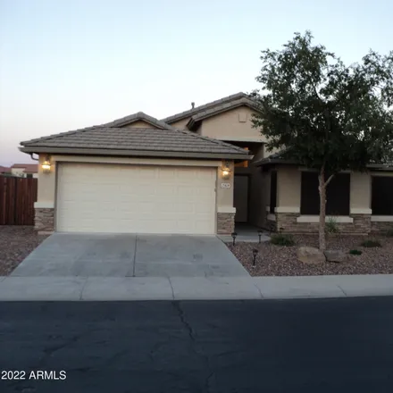 Rent this 3 bed house on 37199 Amalfi Avenue in Maricopa, AZ 85138