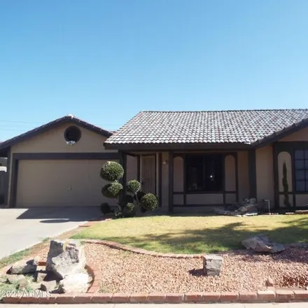 Rent this 3 bed house on 5648 West Villa Theresa Drive in Glendale, AZ 85308