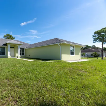 Buy this 4 bed house on 14909 Citrus Grove Boulevard in Palm Beach County, FL 33470