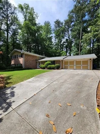 Rent this 5 bed house on 1672 North Springs Drive in Dunwoody, GA 30338