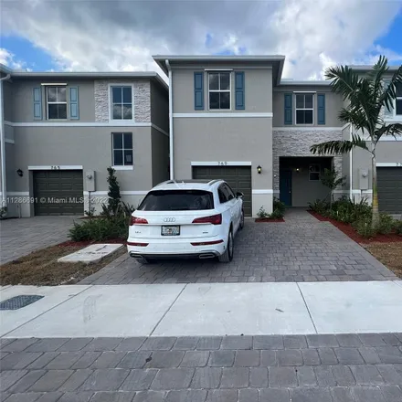 Rent this 3 bed townhouse on 769 Southeast 17th Court in Homestead, FL 33034