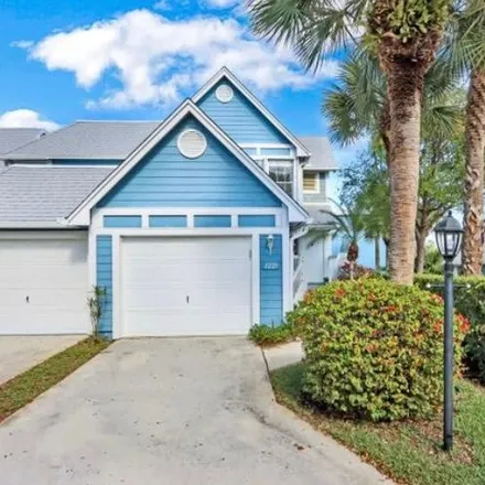 Buy this 3 bed townhouse on 1221 Ocean Dunes Circle in Jupiter, FL 33477