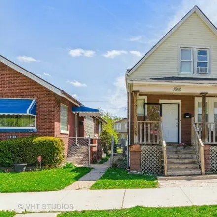Buy this 3 bed house on 10111 South Perry Avenue in Chicago, IL 60628