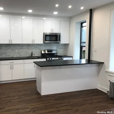 Rent this 2 bed apartment on 39-10 50th Street in New York, NY 11377