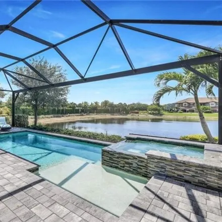 Buy this 3 bed house on 9317 Terresina Drive in Esplanade Golf & Country Club, Collier County