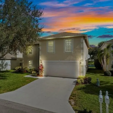 Rent this 4 bed house on 1212 25th Terrace SW in Florida Ridge, FL 32968
