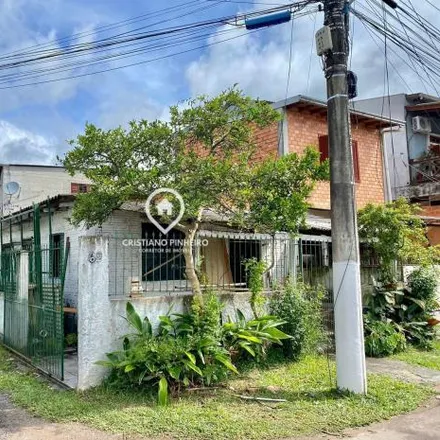 Buy this 3 bed house on Rua Fernando Cortes in Cohab B, Gravataí - RS