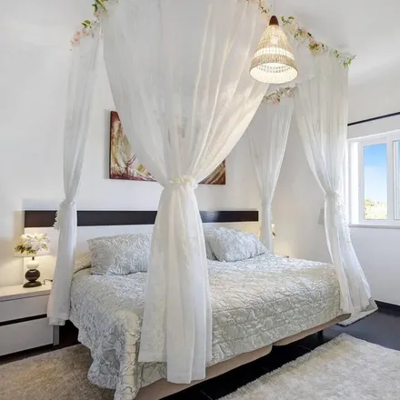 Rent this 4 bed house on 8400-559 Distrito de Évora