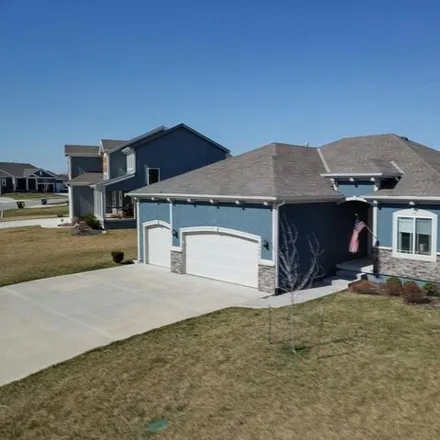 Buy this 5 bed house on 1778 Southwest Merryman Drive in Lee's Summit, MO 64082