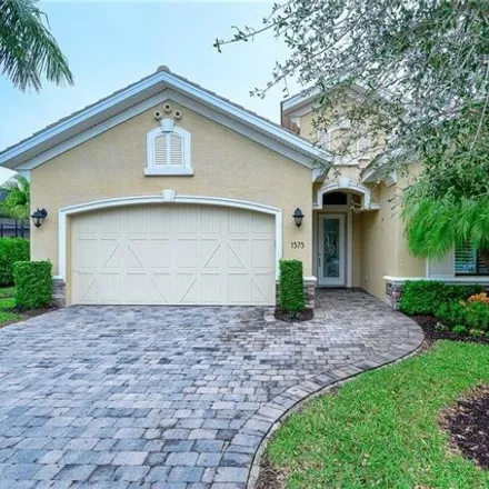 Rent this 3 bed house on 1571 Serrano Circle in Collier County, FL 34105