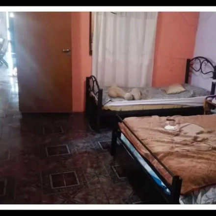 Buy this 4 bed house on Vicente Vildoza in Presidente Sarmiento, M5504 GRQ Godoy Cruz