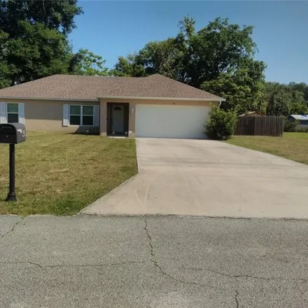 Rent this 3 bed house on 56 Dahlia Drive in DeBary, FL 32713