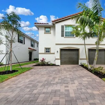 Rent this 3 bed house on unnamed road in Poincianna Place, Palm Beach County