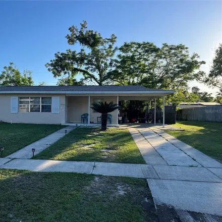Buy this 4 bed house on 1452 Falmouth Avenue in Deltona, FL 32725