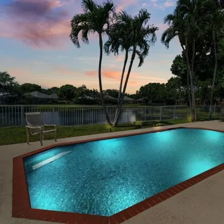 Buy this 3 bed house on 8587 Doverbrook Drive in North Palm Beach, FL 33410