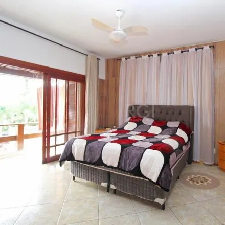Buy this 3 bed house on unnamed road in Vila Nova, Porto Alegre - RS
