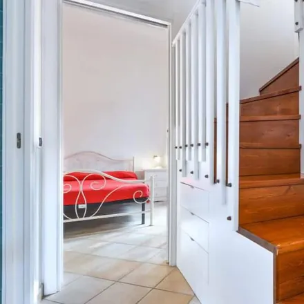 Rent this 2 bed house on 57038 Rio Marina LI