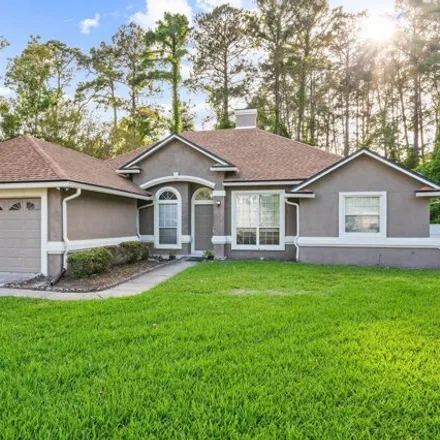 Buy this 4 bed house on 5924 Covered Creek Lane in Jacksonville, FL 32277