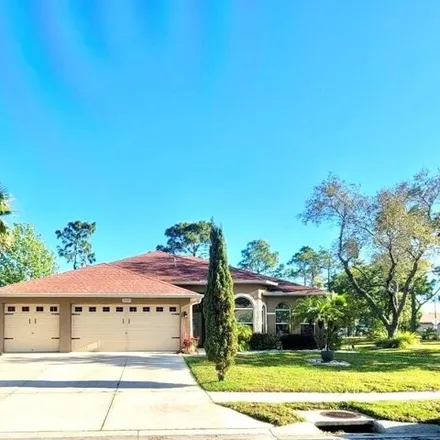 Buy this 4 bed house on 5684 Brackenwood Dr in Florida, 34609