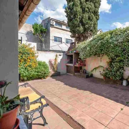 Buy this 3 bed house on 700 - Aviador Plüschow in Partido de Tres de Febrero, 1682 Ciudad Jardín Lomas del Palomar