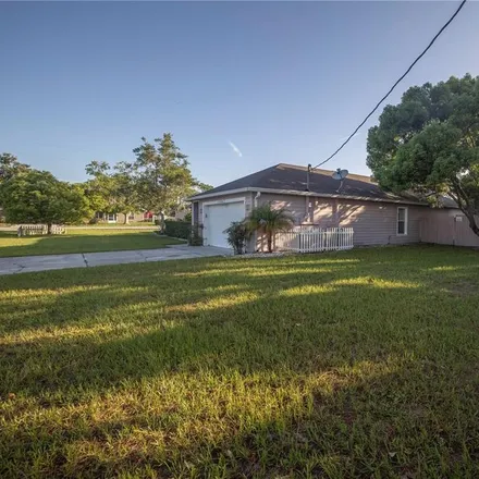 Buy this 4 bed house on 11447 Exmore Street in Spring Hill, FL 34609