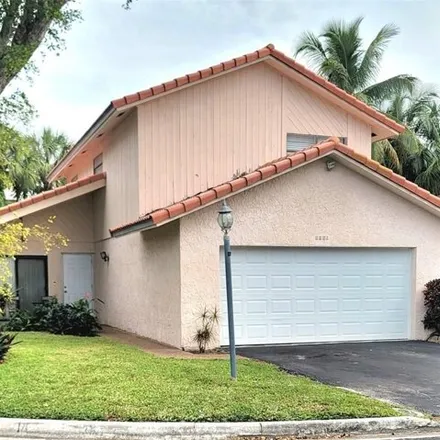 Buy this 3 bed house on Spring Circle Drive in Coral Springs, FL 33071