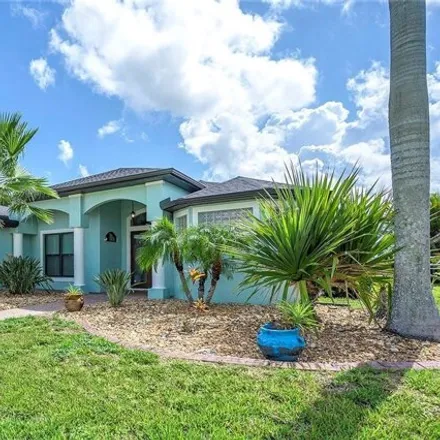 Buy this 4 bed house on 2614 Southwest 21st Avenue in Cape Coral, FL 33914
